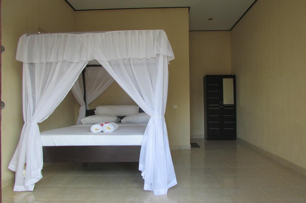 Warung Jemeluk & Home Stay Amed Habitación foto